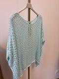 Top ample stylo poncho à crochet