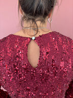 Blouse à paillettes bordeaux